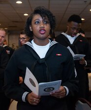 PORTSMOUTH, R.I. (Dec. 2, 2022) Religious Program Specialist Seaman Kentaija Brown, a student assigned to Naval Chaplaincy School sings  “Eternal Father” during the Navy Chaplain Ball, at the Green Valley Country Club, Dec. 2, 2022. This year's event celebrates 247 years since the formation of the Navy Chaplain Corps. (U.S. Navy photo by Mass Communication Specialist 2nd Class Derien C. Luce)