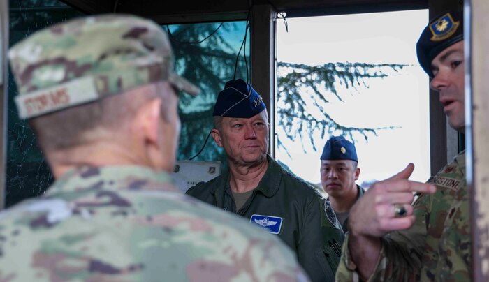 U.S. Air Force Gen. Mark Kelly, commander of Air Combat Command, discusses daily operations of the Wheatland Gate to Beale Air Force Base, Calif. with Maj. Patrick Livingstone, 9th Security Forces commander on Dec. 6, 2022.