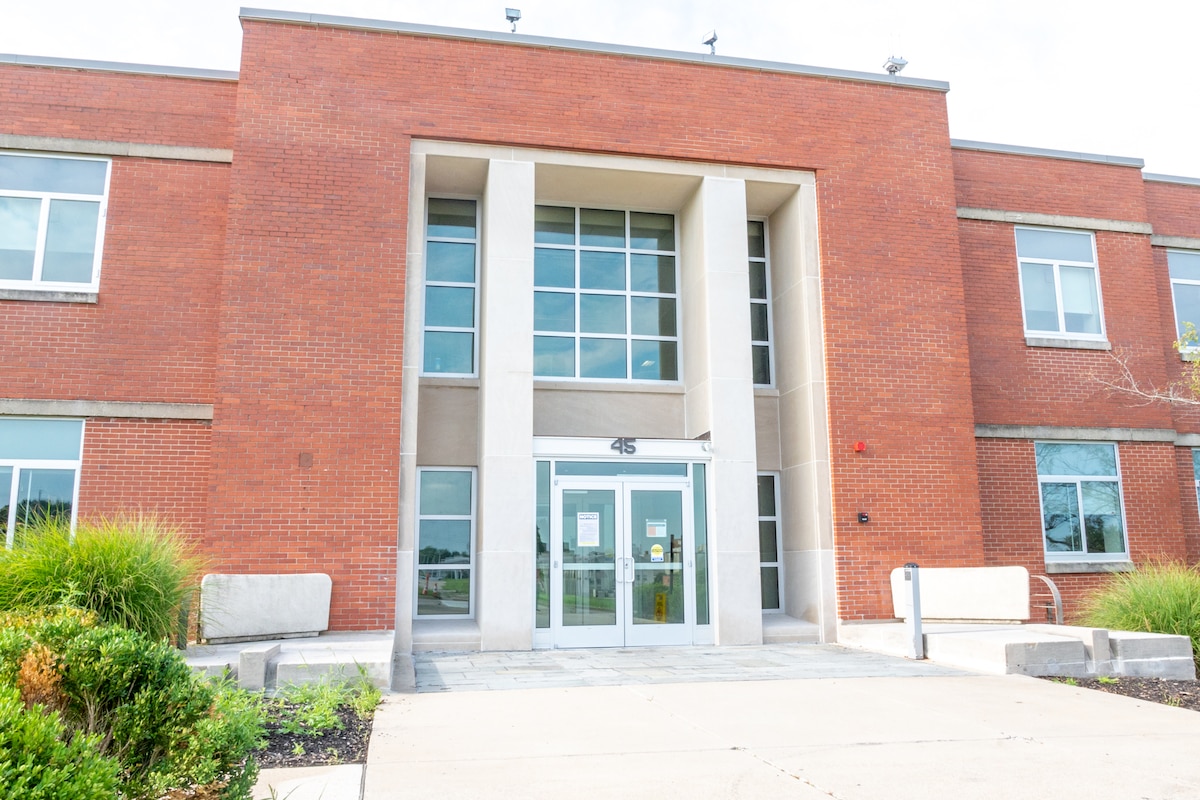 Exterior entrance of the recently renovated building 45 on Wright-Patterson Air Force Base, Ohio, July 29, 2022. The 88th Civil Engineer Group received the 2022 Citation Award for their work on building 45, part of the Air Force Research Laboratory’s Aerospace Systems Directorate. (U.S. Air Force photo / Todd McLaren)