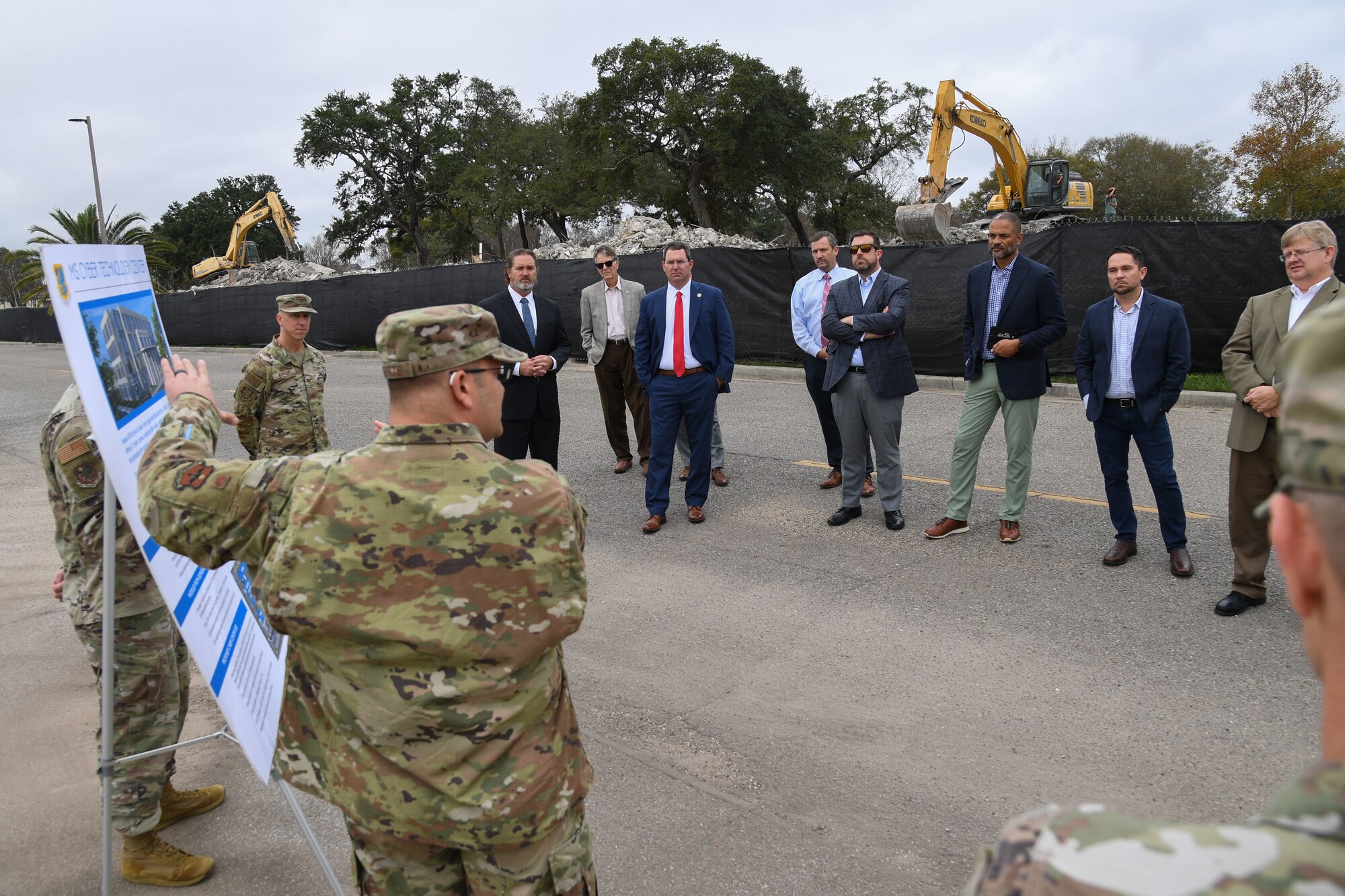 U.S. Air Force Lt. Col. James Roberts, 81st Training Group deputy commander, briefs state and local civic leaders on the new Mississippi Cyber Center construction project during A Day At Keesler at Keesler Air Force Base, Mississippi, Dec. 9, 2022.