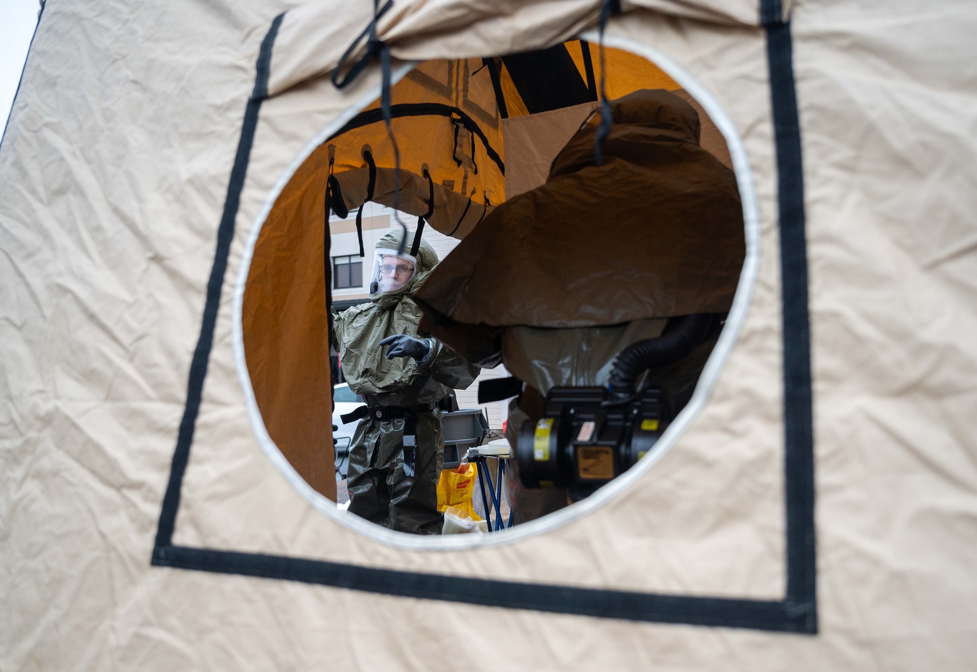 Members from the 436th Medical Group perform decontamination processes during a major accident response exercise at Dover Air Force Base, Delaware, Dec. 7, 2022. The three-day exercise tested the response capabilities of Team Dover through various scenarios in an effort to strengthen their ability to provide rapid-global mobility in challenging conditions. (U.S. Air Force photo by Senior Airman Faith Barron)