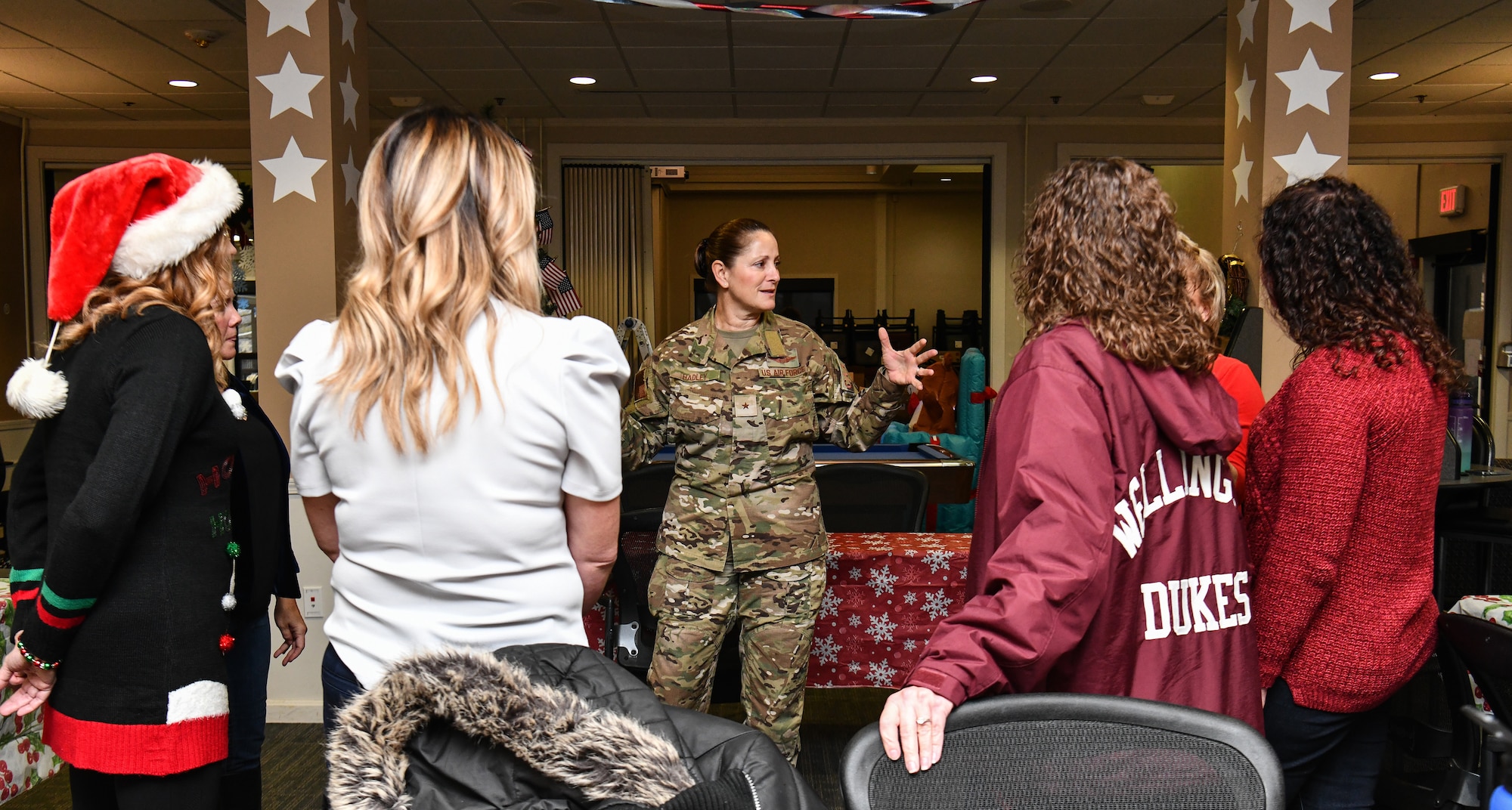 Brig. Gen. Leslie S. Hadley, mobilization assistant to the commander assigned to the 18th Air Force, speaks with 910th Airlift Wing Key Spouses during a visit at Youngstown Air Reserve Station, Dec. 3, 2022.