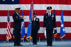 Gen. Thomas Bussiere, Air Force Global Strike Command commander, is congratulated by Air Force Chief of Staff Gen. CQ Brown, Jr. during the AFGSC change of command ceremony at Barksdale Air Force Base, La., Dec. 7, 2022.
