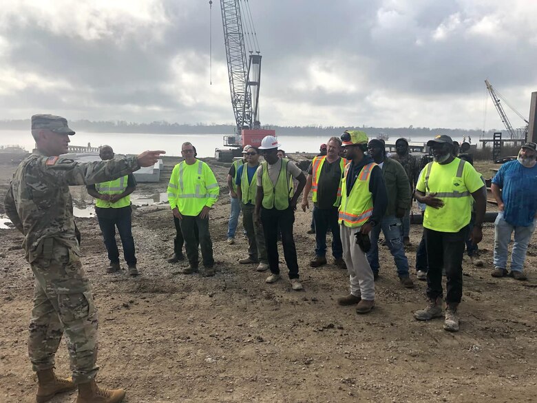 Memphis District Commander Col. Brian Sawser recently visited St. Francisville, a project site in Louisiana, where he met with the district’s hardworking Revetment Team and reviewed progress made at the site thus far. Our Memphis District uses a vintage 1949 barge mounted Bucyrus-Erie dragline with a 183 foot boom and a 15 cubic yard bucket to complete grading operations. Additional earthmoving capacity is provided by a compliment of bulldozers.