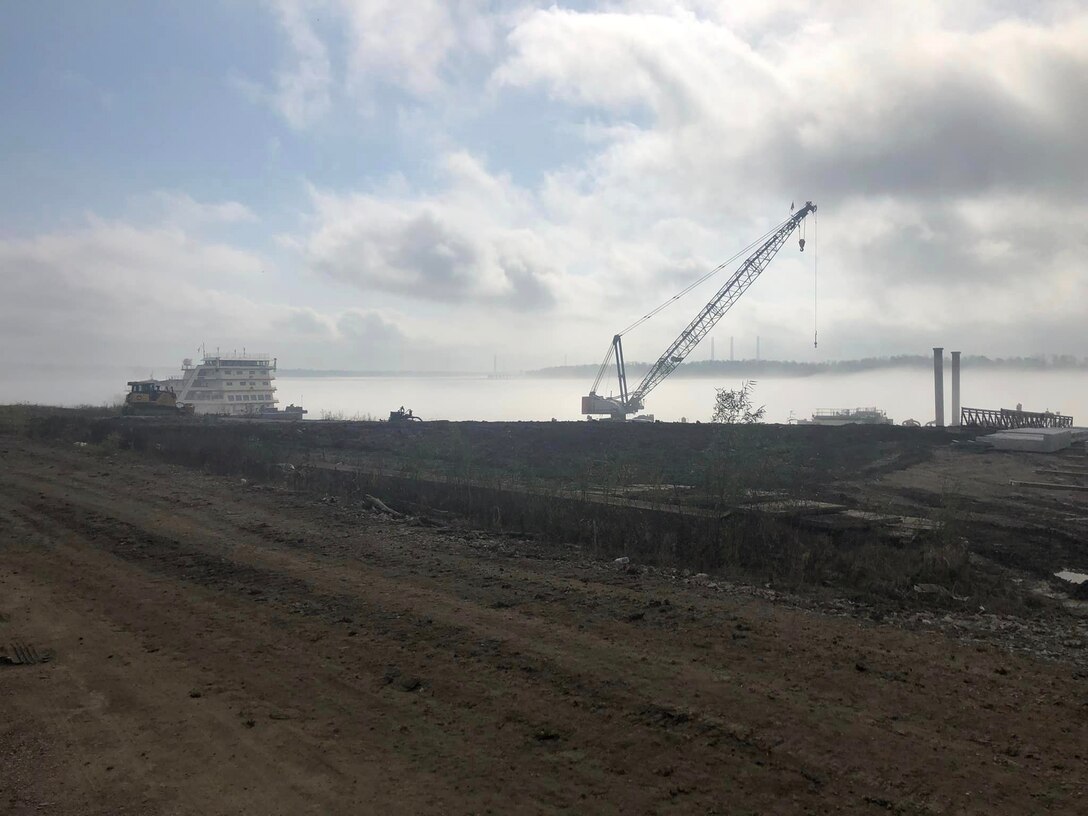 Our Memphis District uses a vintage 1949 barge mounted Bucyrus-Erie dragline with a 183 foot boom and a 15 cubic yard bucket to complete grading operations. Additional earthmoving capacity is provided by a compliment of bulldozers.