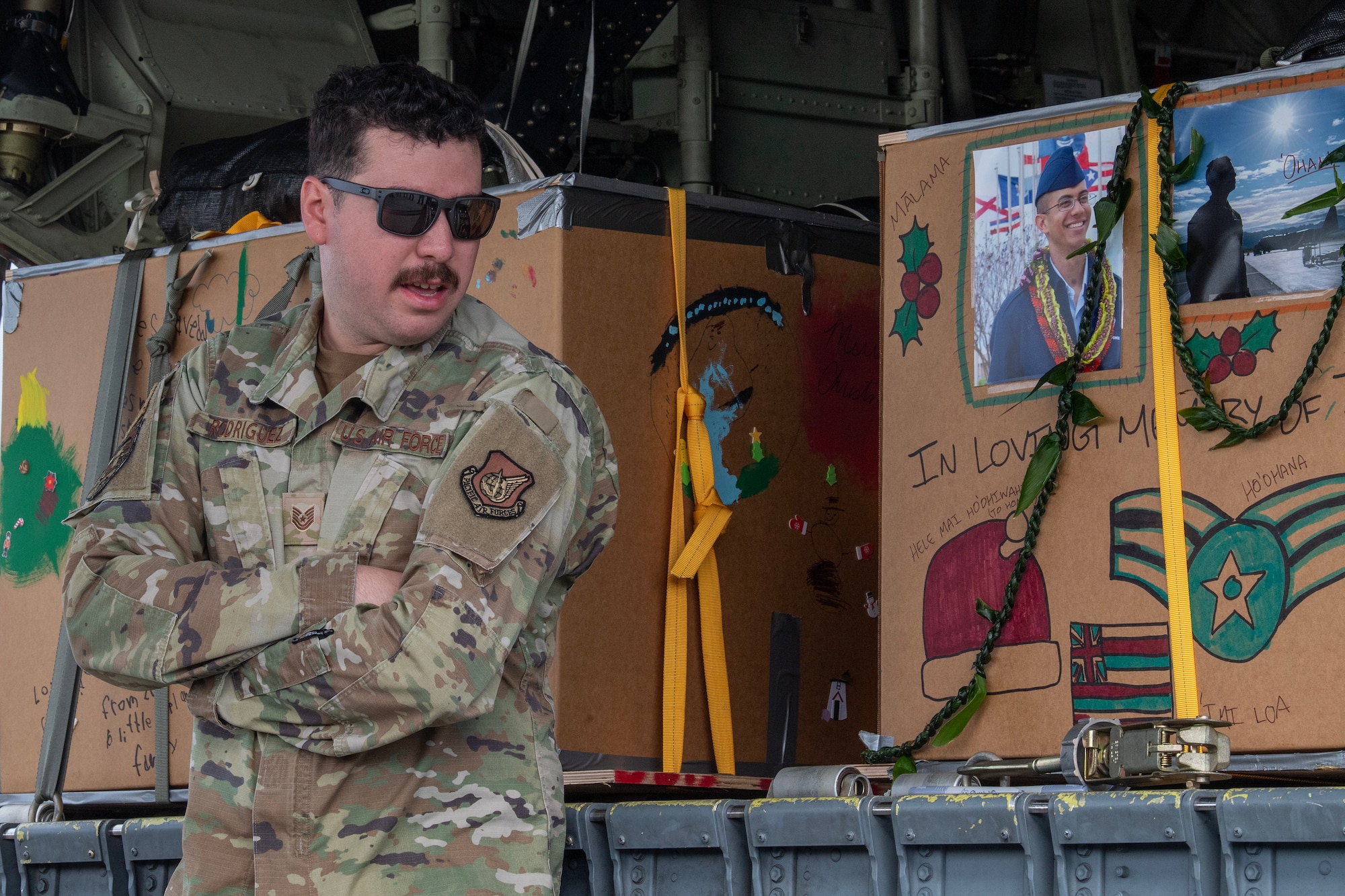 A U.S. Air Force Airmen delivers remarks during a memorial ceremony