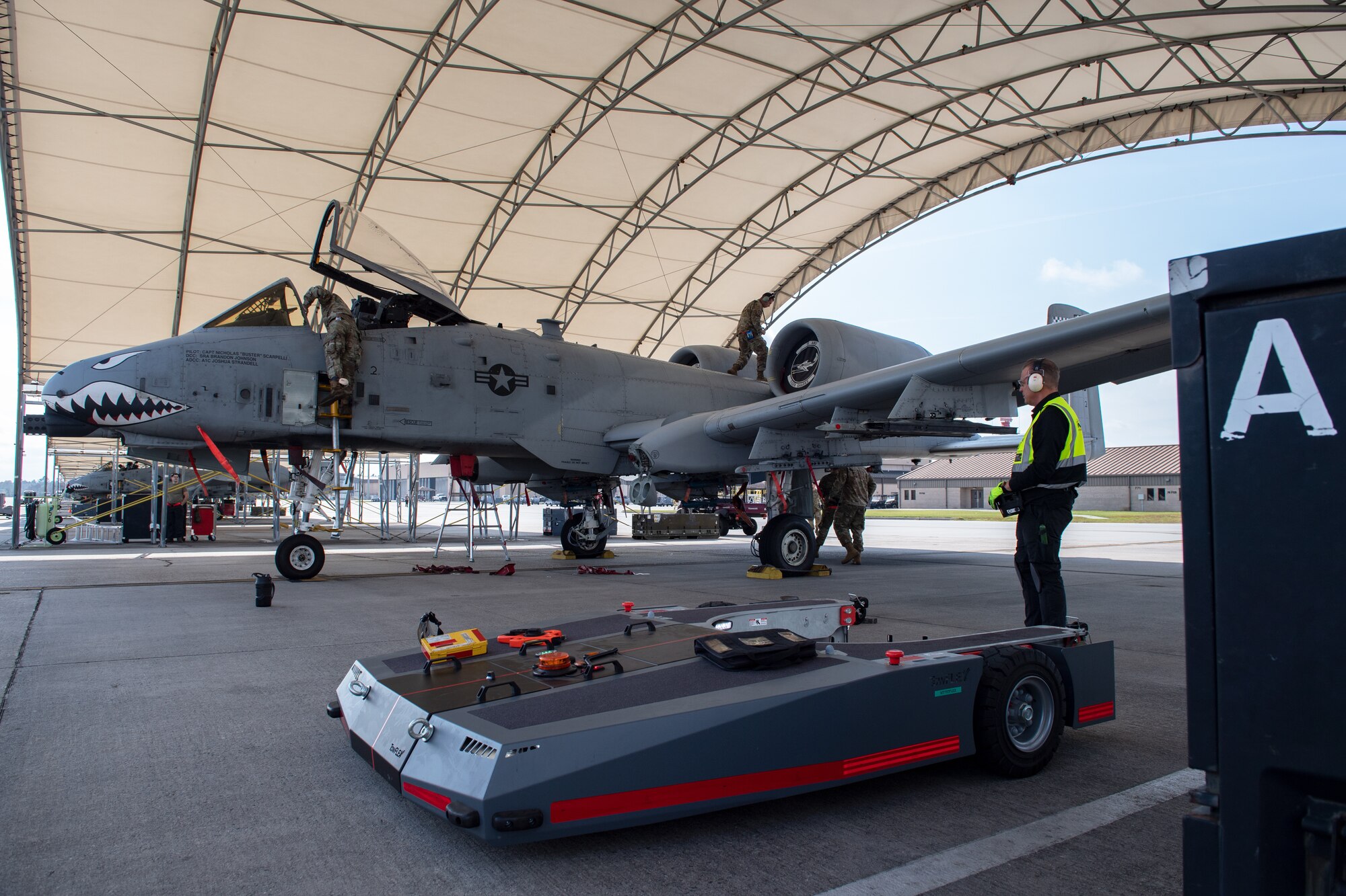 Airmen prepare an aircraft for use in TowFLEXX training.