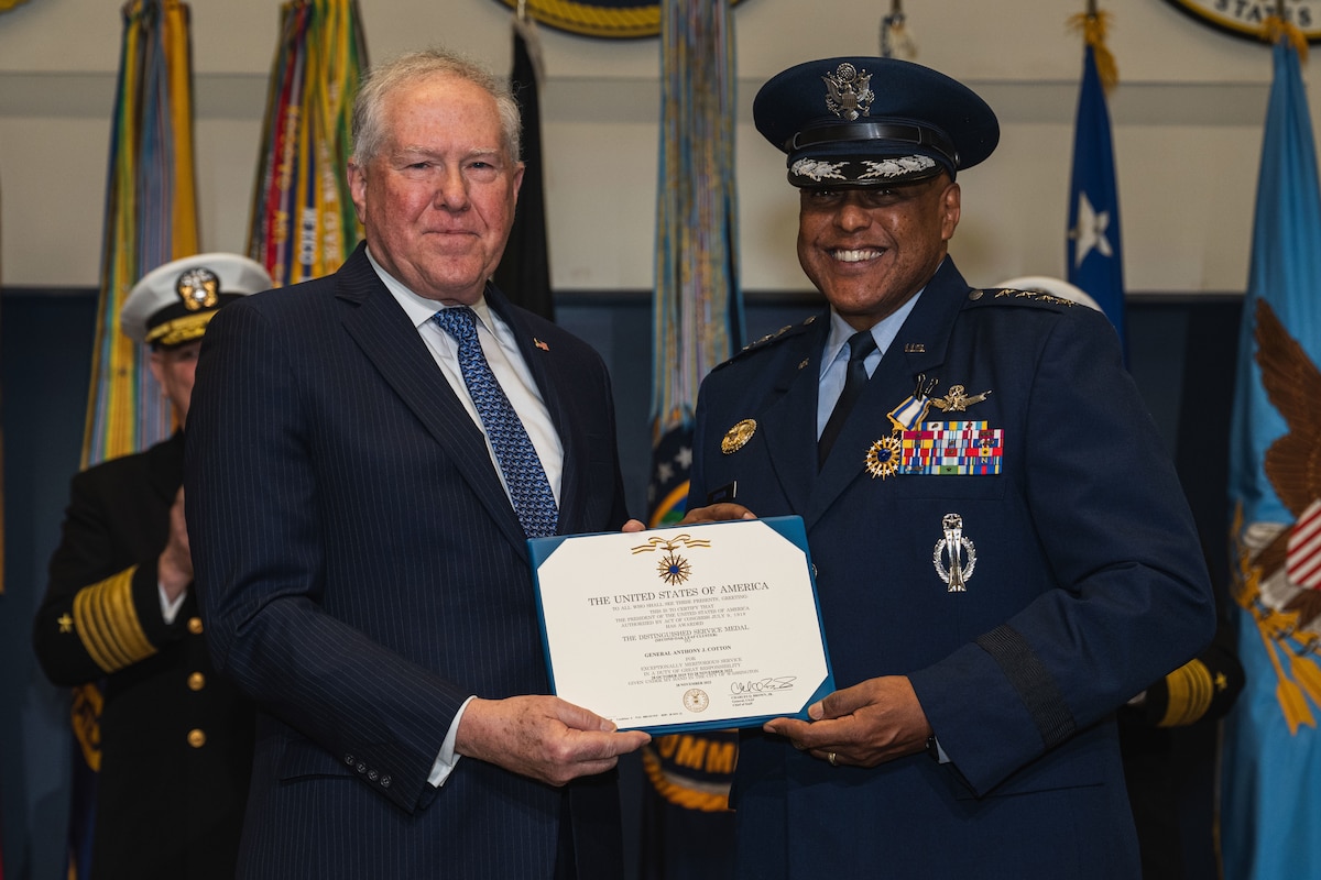 Secretary of the Air Force Frank Kendall awards Gen. Anthony J. Cotton with the Distinguished Service Medal for his time served as the global strike commander at the General Curtis E. LeMay Command and Control Facility, Omaha, Neb., Dec. 9, 2022. (Department of Defense photo by U.S. Navy Petty Officer 2nd Class Alexander Kubitza)