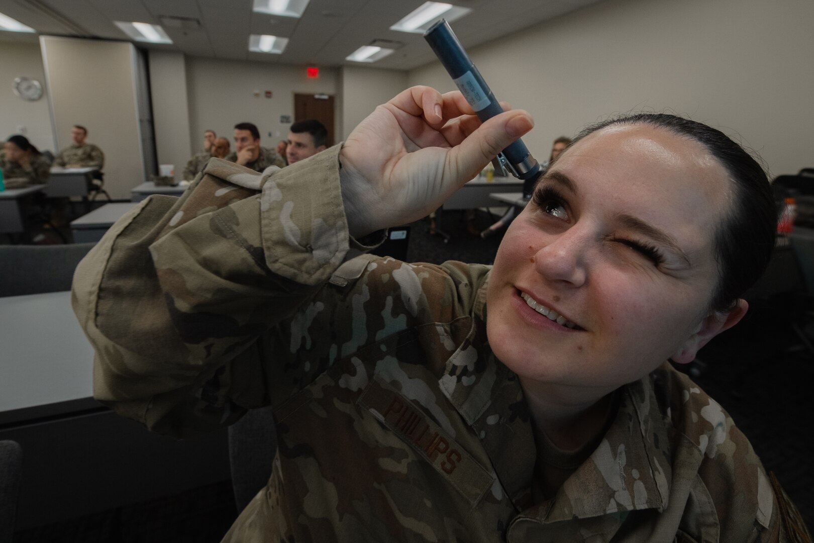 U.S. Air Force Senior Airman Samantha Phillips, 1st Special Operations Medical Readiness Squadron bioenvironmental engineering technician, Hurlburt Field, Florida, inspects a probe device used for radiation detection at MacDill Air Force Base, Florida, Dec. 7, 2022.