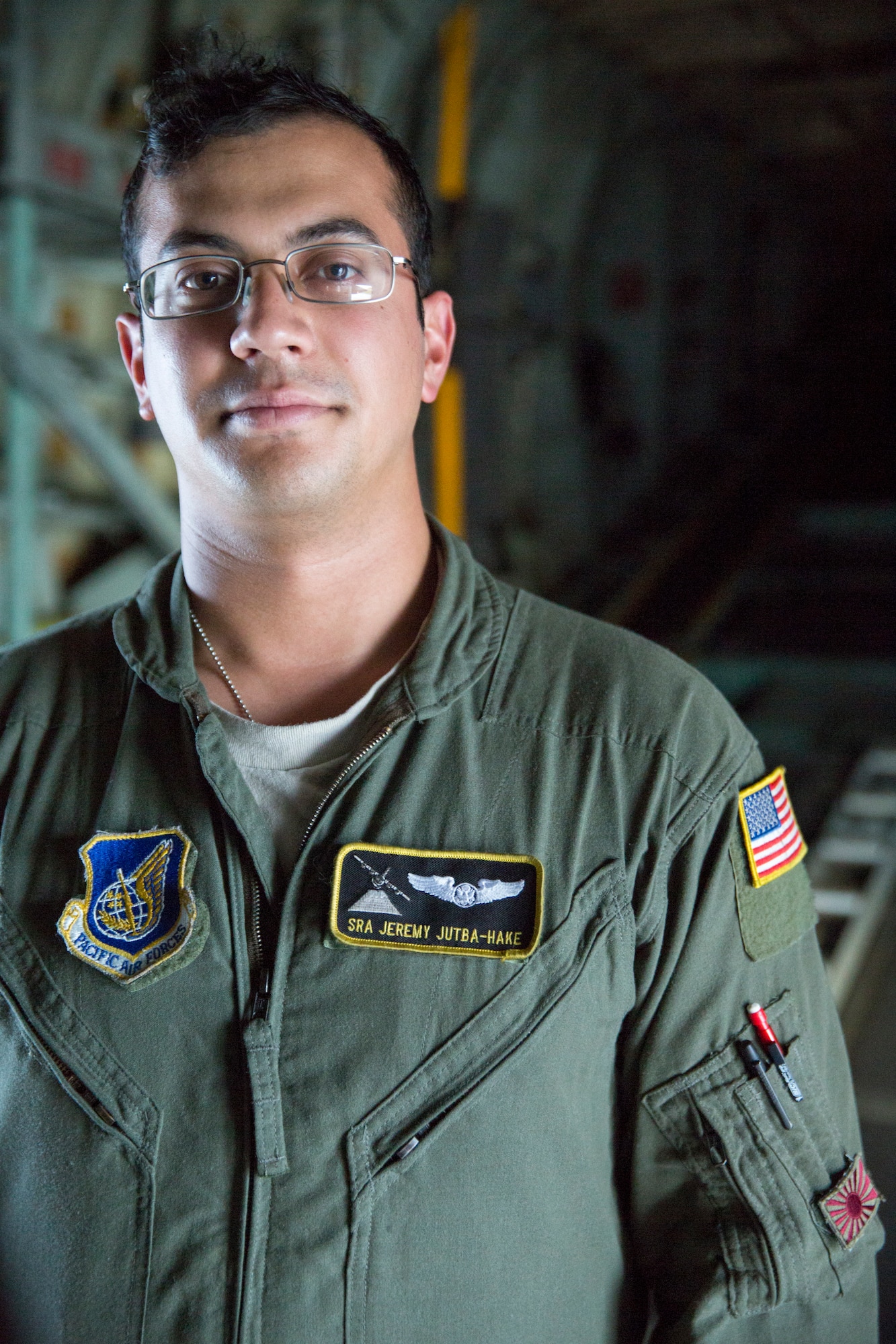 Senior Airman Jeremy Jutba-Hake, 36th Airlift Squadron loadmaster, poses for a photo