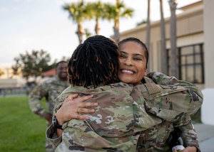 U.S. Air Force Senior Master Sgt. Nicole Franklin, U.S. Central Command superintendent of command and control communication and computer systems division, is congratulated for her selection to chief master sergeant at MacDill Air Force Base, Florida, Dec. 7, 2022. Out of 2,526 eligible candidates, 514 senior master sergeants were selected for promotion to chief master sergeant. (U.S. Air Force photo by Senior Airman Lauren Cobin)