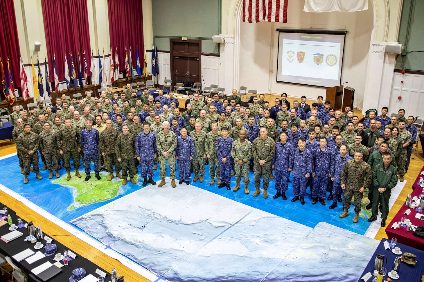 221209-N-IY633-1092 YOKOSUKA, Japan (Dec. 9, 2022) – Leadership and staff from U.S. 7th Fleet, III Marine Expeditionary Force and Japan Self-Defense Forces pose for a photo during Naval Integration staff talks Dec. 9 onboard Fleet Activities Yokosuka, Japan. 7th Fleet is the U.S. Navy's largest forward-deployed numbered fleet, and routinely interacts and operates with 35 maritime nations in preserving a free and open Indo-Pacific region. (U.S. Navy photo by Chief Mass Communication Specialist Amanda Kitchner)