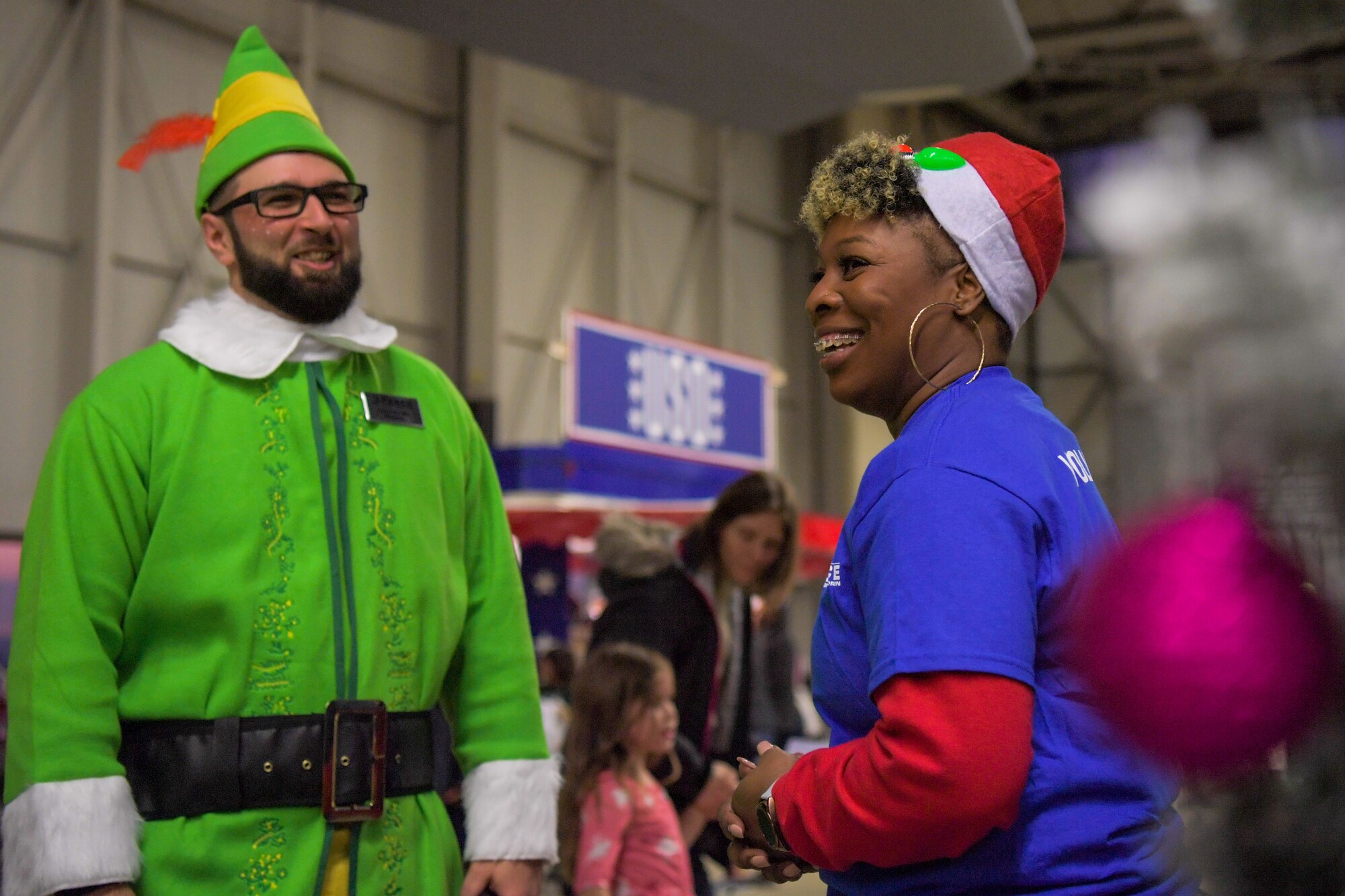 Volunteers help guests