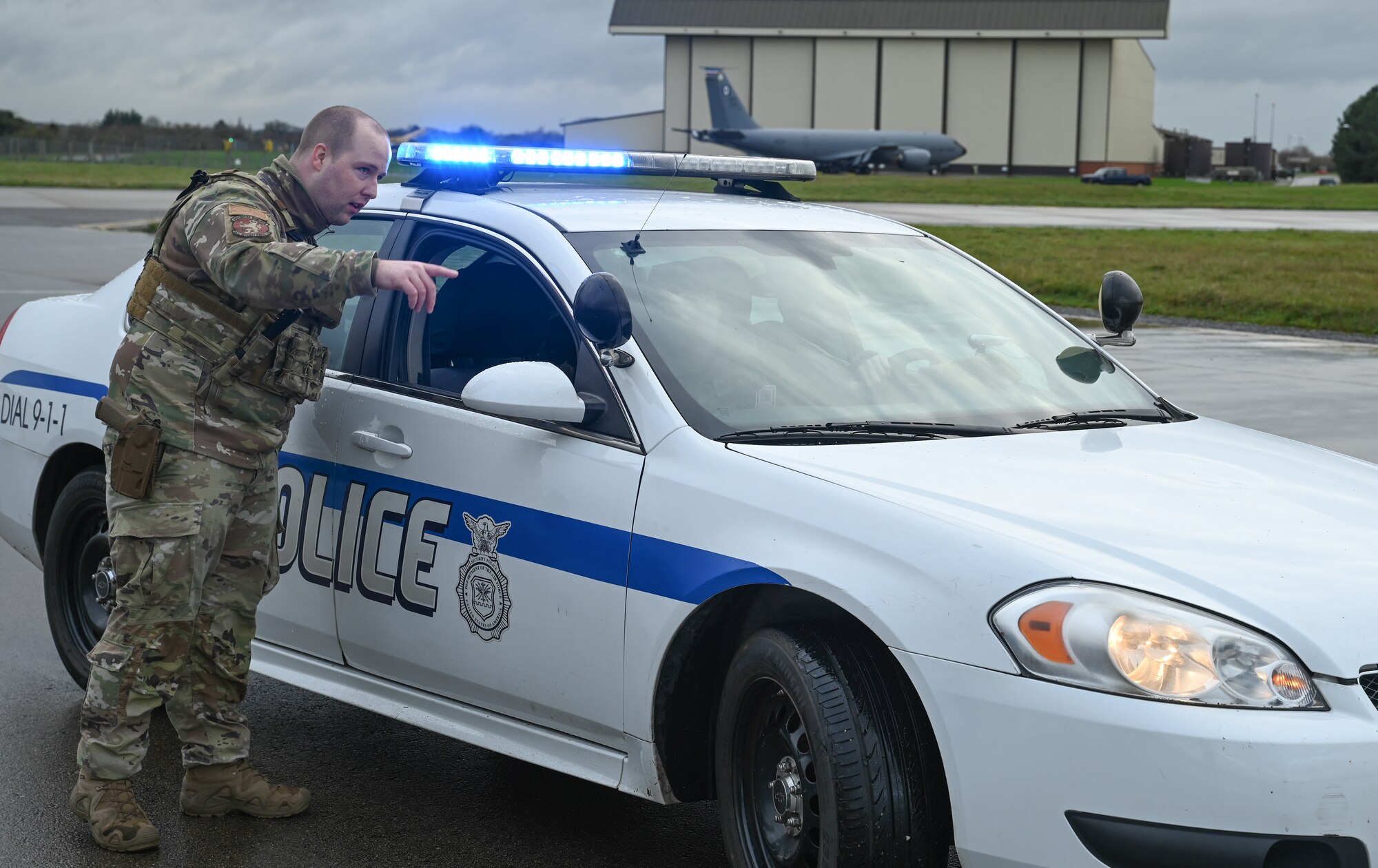 Team Mildenhall Defenders set up a perimeter around the simulated crash site to protect the base population, secure the scene and allow the 100th Air Refueling Wing Inspector General to conduct thorough observation.