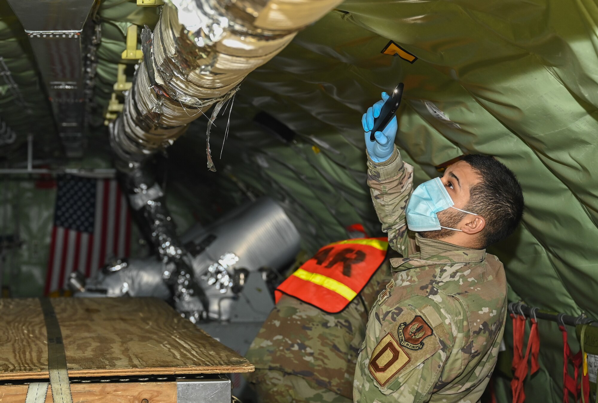 The Airmen responded to a simulated aircraft crash as a search and rescue team looked for any foreign objects to aid the investigation team with their report.