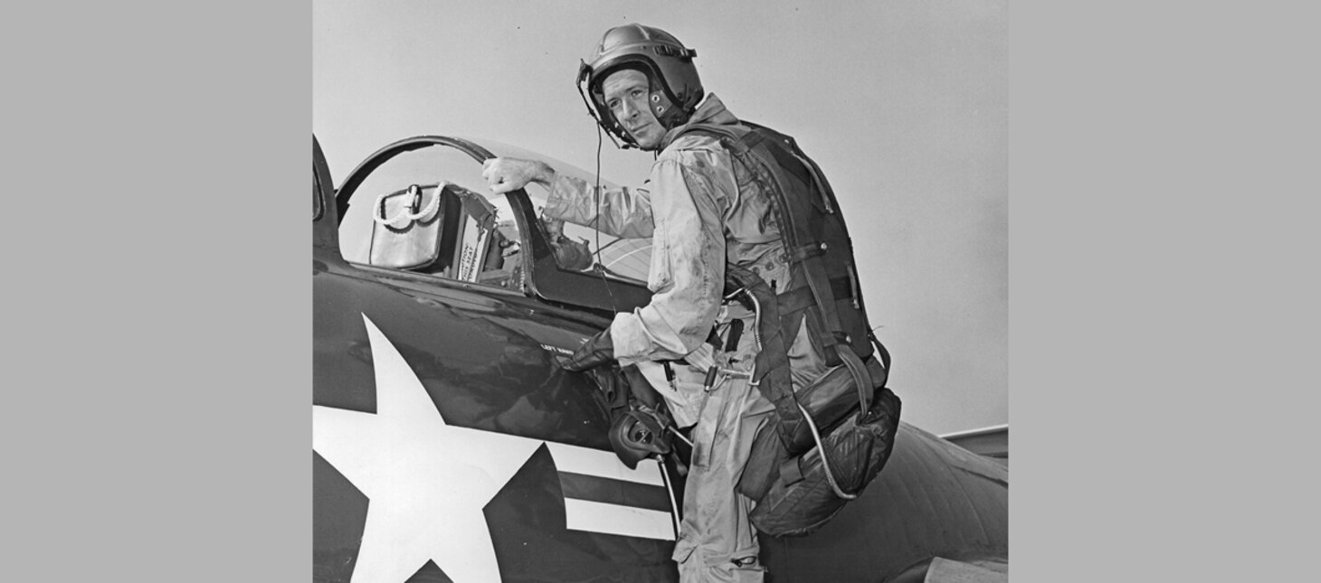 Red Sox left fielder Ted Williams prepares to get into his F9F Panther. Williams gained his Wings of Gold as a Marine/Naval Aviator in WWII. Although he did not see action, he served as a flight instructor. After the war, he remained in the Marine Reserve, and to everyone’s surprise, he was recalled to action during the Korean War, even though he had not flown a plane for eight years. After refresher training and transition training to the F9F Panther, he was assigned to VMF-311, often flying as John Glenn’s wingman.