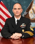 Master Chief Brandt poses for a photo