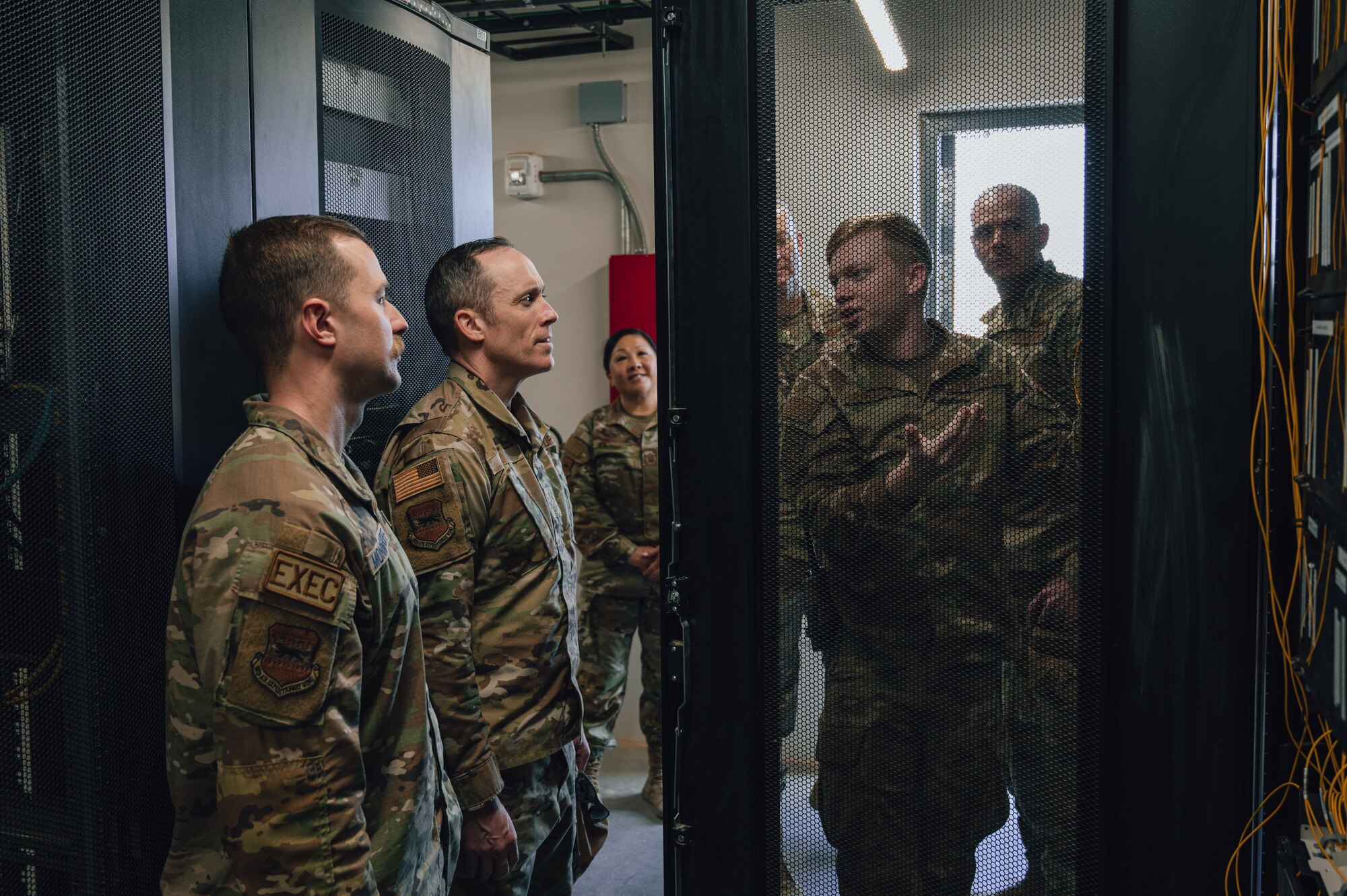 Airman First Class Cameron Phillips, Network Infrastructure Technician, 332d Air Expeditionary
Communications Squadron, instructs leaders from around base on infrastructure transfer
building capabilities as part of the “Red Tail Connection” program at an undisclosed location in
Southwest Asia, Dec. 12, 2022. These immersion visits provide greater insight into the unique
skillsets every Airman brings to the 332d Air Expeditionary Wing Red Tail team. (U.S. Air Force
photo by Tech. Sgt. Richard Mekkri)