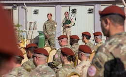 Soldiers stand in remembrance