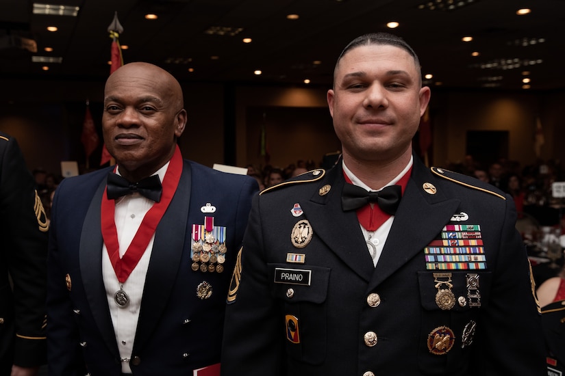 Senior Enlisted Advisor Tony Whitehead (right) and Army Sgt. First Class Chris Praino (right) at the 138th Field Artillery Brigade, Kentucky National Guard, annual ball in Lexington, Ky. on Dec. 3, 2022. Whitehead was nominated by Praino into the order after 40 years of military service. (U.S. Army photo by Staff Sgt. Andrew Dickson)