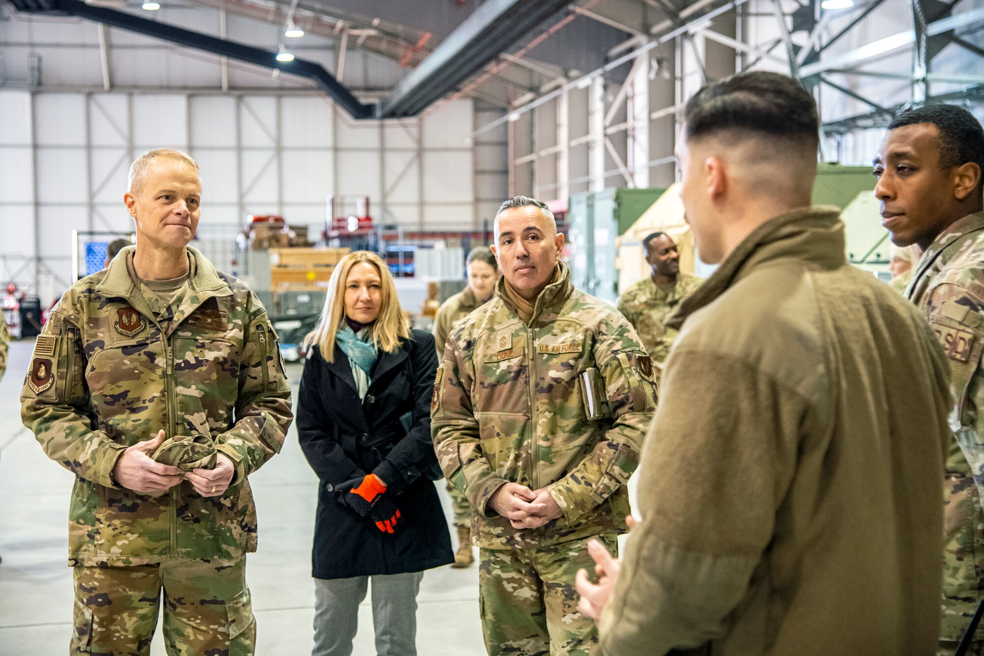 U.S. Air Force Maj. Gen. Derek France, left, Third Air Force commander, speaks with U.S. Airmen from the 99th Expeditionary Reconnaissance Squadron at RAF Fairford