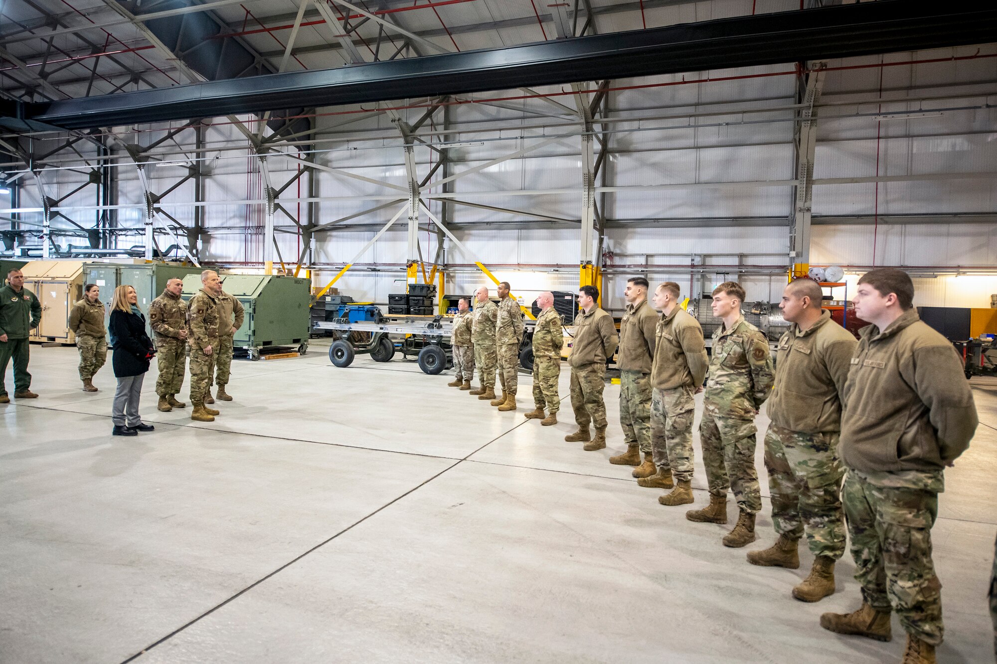 U.S. Air Force Maj. Gen. Derek France, left, Third Air Force commander, speaks with U.S. Airmen from the 99th Expeditionary Reconnaissance Squadron at RAF Fairford