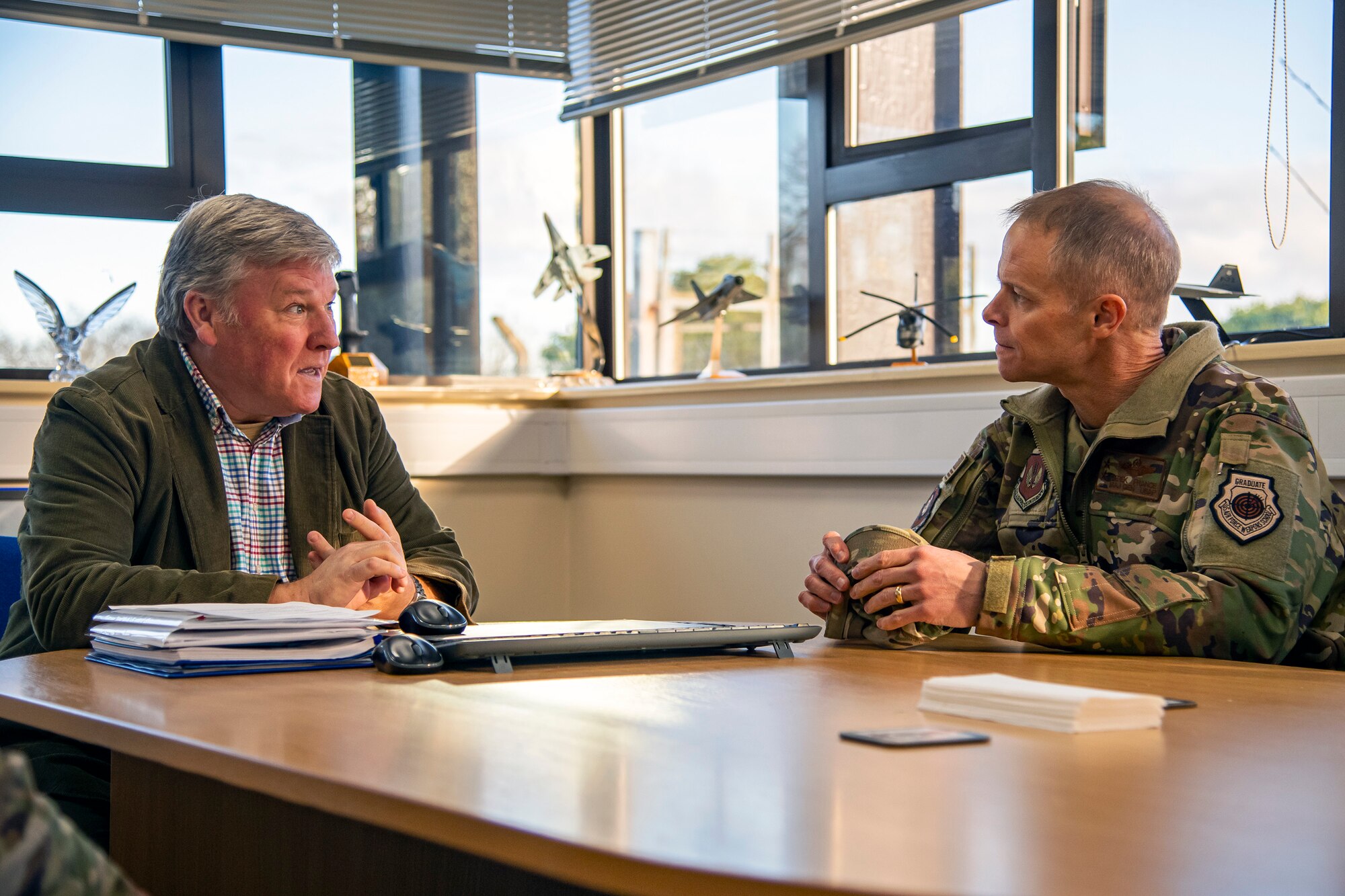 U.S. Air Force Maj. Gen. Derek France, right, Third Air Force commander, meets with Paul Atherton, Royal International Air Tattoo Chief Executive Officer at RAF Fairford