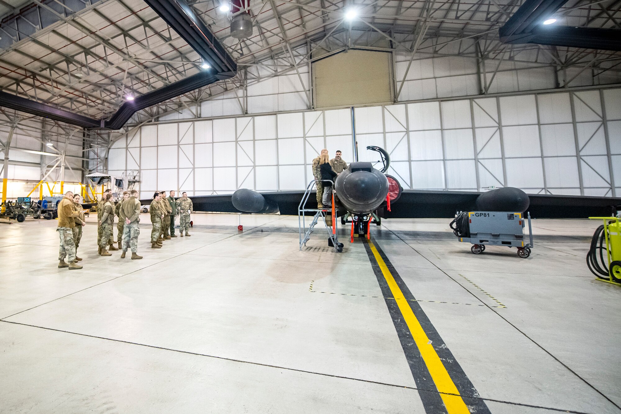 U.S. Air Force, Maj. Gen. Derek France, center, Third Air Force commander, and his spouse Mrs. Amanda France, look into the cockpit of a U-2 Dragon Lady at RAF Fairford