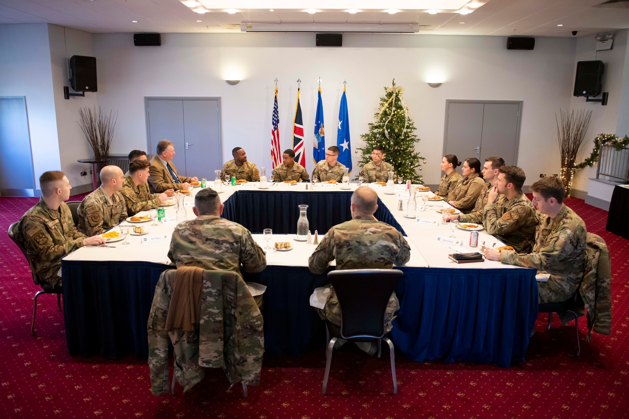 U.S. Air Force, Maj. Gen. Derek France, center right, Third Air Force commander, and U.S. Air Force Chief Master Sgt. Heriberto Diaz, center left, 3rd AF command chief, speak with Airmen at RAF Croughton