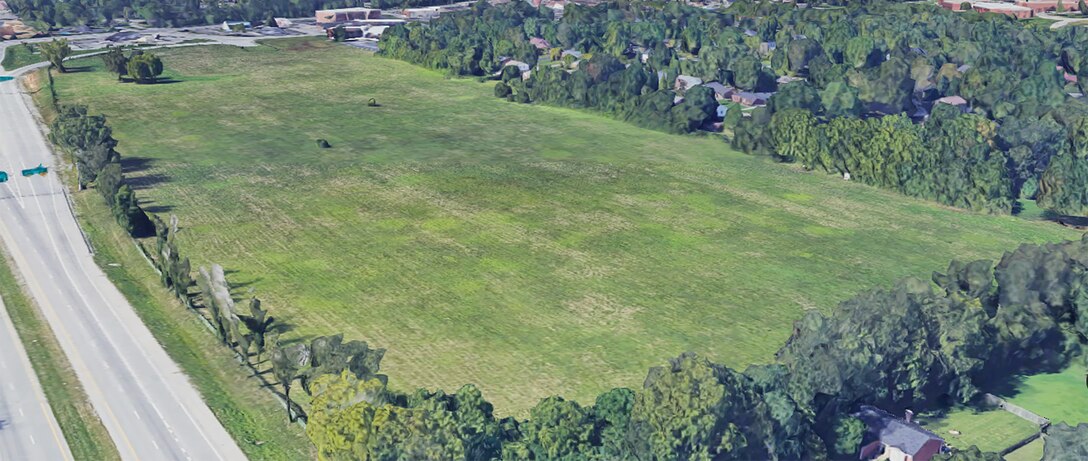 Google maps arial image showing the property before construction began when it was still an open, grass filled field.