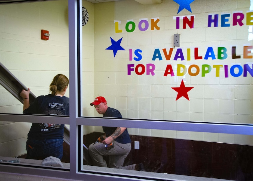 Helping Man & Beast -- NAVIFOR Sailors Give Back to Local Animal Shelter  supporting photo