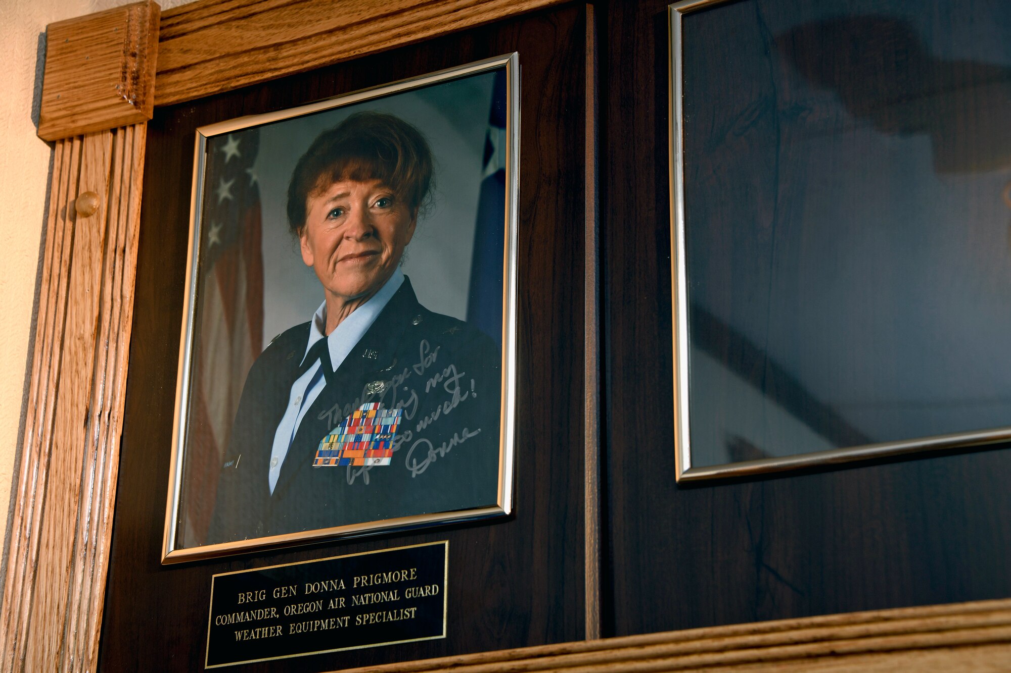 A photo of Brig. Gen. Donna M. Prigmore, Oregon Air National Guard commander, hangs on the Wall of Achievers at the Enlisted Heritage Hall, Maxwell Air Force Base Gunter Annex, Ala., Dec. 9, 2022.