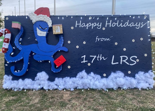 The 17th Logistics Readiness Squadron’s holiday card is displayed on the parade field, Goodfellow Air Force Base, Texas, Dec. 1, 2022. Units designed holiday cards to compete in the yearly tradition. (U.S. Air Force photo by Airman 1st Class Zachary Heimbuch)