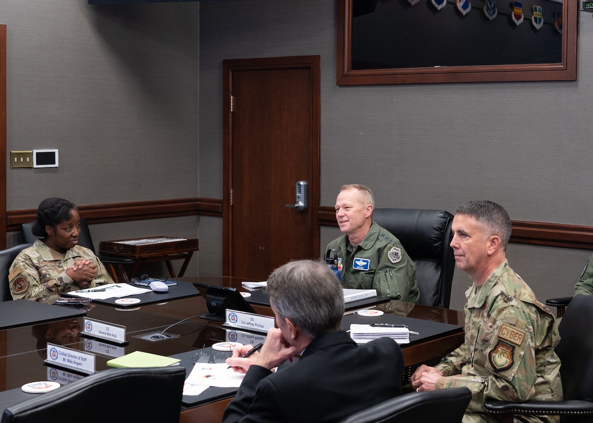 Gen. Mark Kelly, commander of ACC, listens to Sword Athena presentations