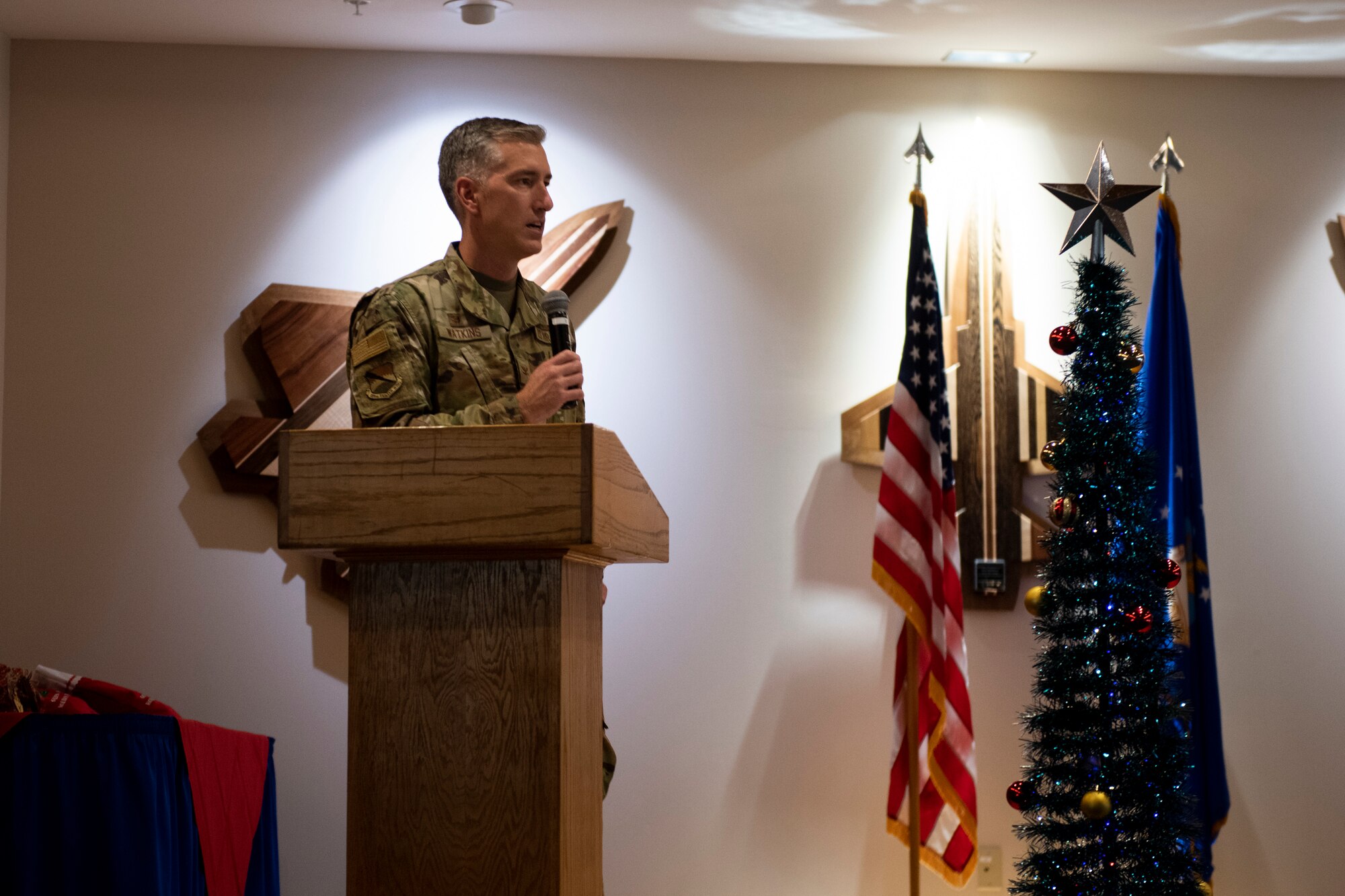 U.S. Air Force Col. George Watkins, 325th Fighter Wing commander, addresses senior citizen veterans at Tyndall Air Force Base, Florida, Dec. 9, 2022