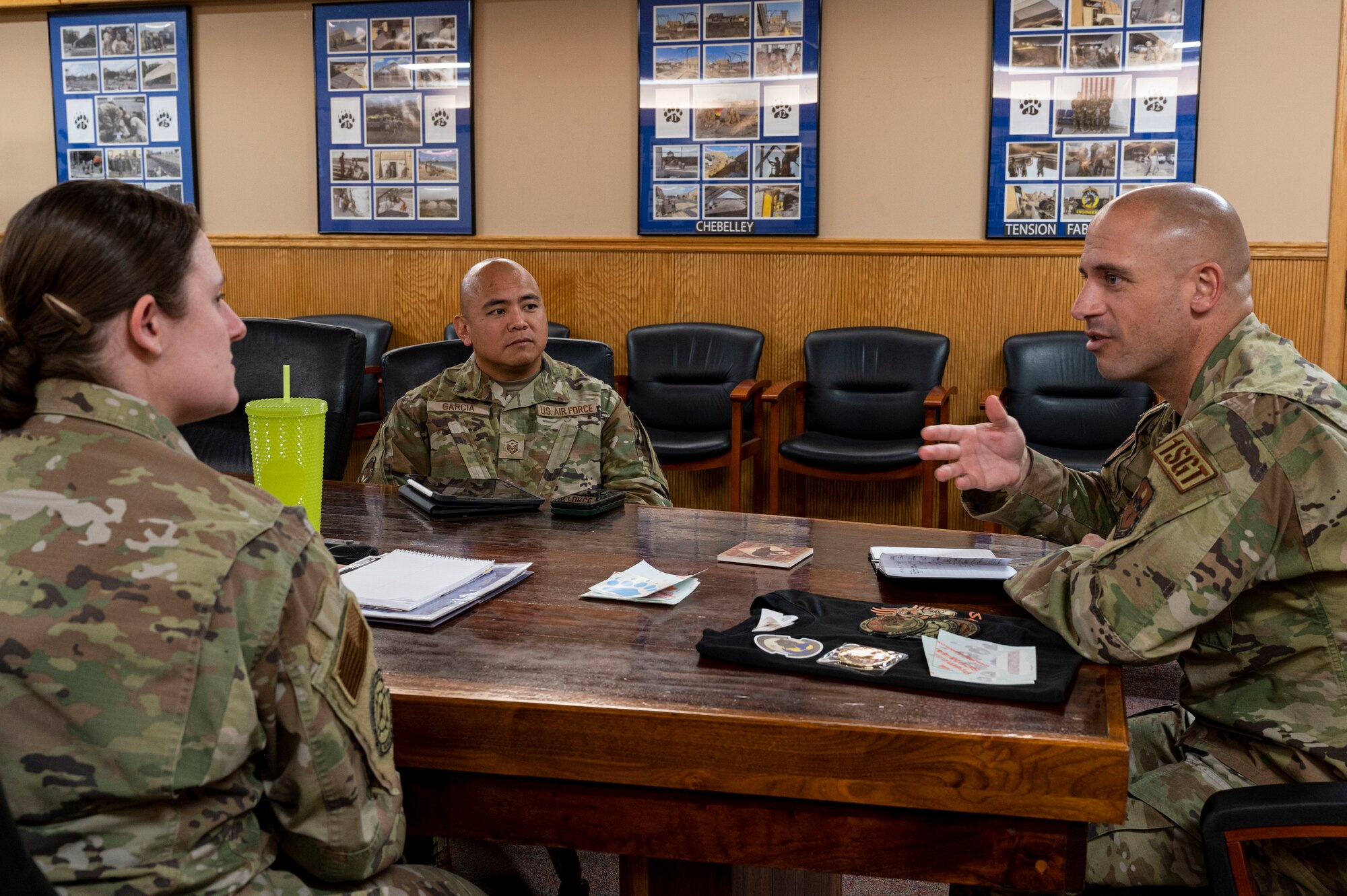 U.S. Air Force Chief Master Sgt. Ryan Taylor, Air Education and Training Command first sergeant, right, speaks to U.S. Air Force Master Sgt. Barbara Thomas, left, 635th Materiel Maintenance Squadron first sergeant, and U.S. Air Force Master Sgt. Thomas Garcia, 635th Materiel Maintenance Support Squadron first sergeant, about the unique challenges of being first sergeants for a tenant unit at Holloman Air Force Base, New Mexico, Dec. 9, 2022. Taylor spoke with Holloman’s first sergeants to discuss solutions for common challenges they face. (U.S. Air Force photo by Airman 1st Class Nicholas Paczkowski)