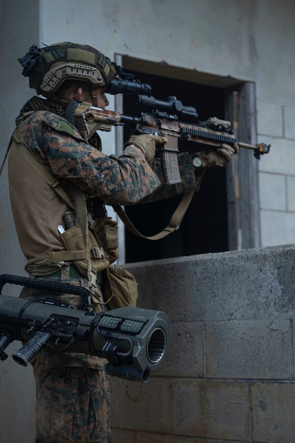 U.S. Marine Corps Cpl. James Chebahtah, a rifleman with 1st Battalion, 2nd Marines, provides security during Stand-in Force Exercise on Okinawa, Japan, Dec 9, 2022. SiF-EX is a Division-level exercise involving all elements of the Marine Air-Ground Task Force focused on strengthening multi-domain awareness, maneuver, and fires across a distributed maritime environment. This exercise serves as a rehearsal for rapidly projecting combat power in defense of allies and partners in the region. Chebahtah is a native of Riverside, CA. (U.S. Marine Corps photo by Cpl. Davin Tenbusch)