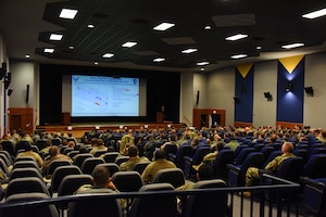 U.S. Air Force Col. William Gutermuth, 514th AMW commander speaks to the audience.