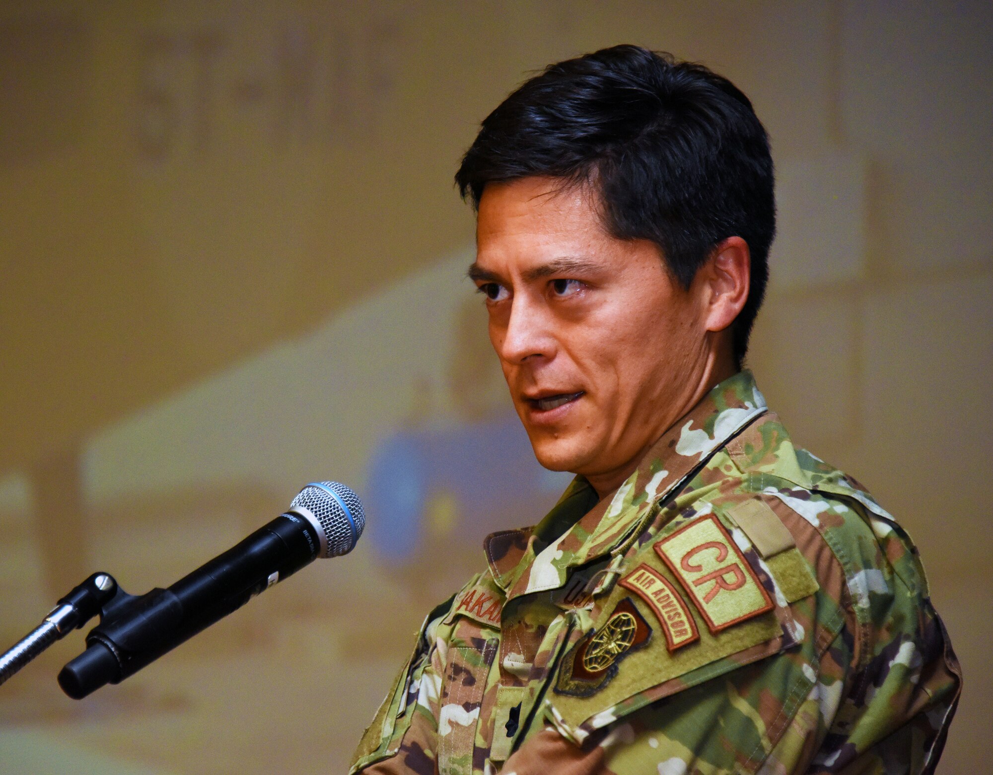 U.S. Air Force Lt. Col. Philemon Sakamoto, 818 Military Support Advisor Squadron Director of Operations, talks to Airmen at the symposium.