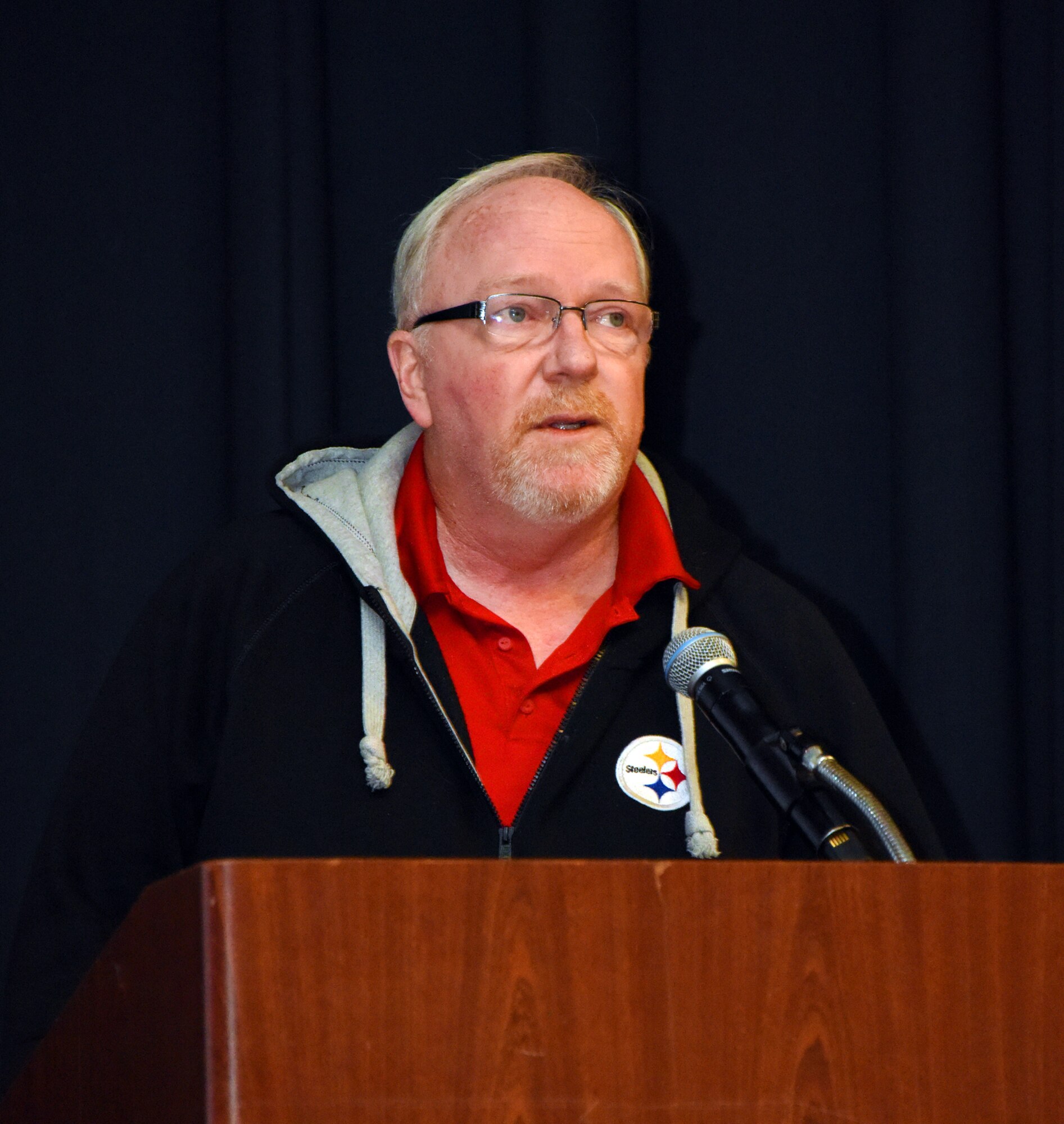 Keith Taylor, 305th Operations Support Squadron McGuire airfield manager, speaks to Airmen at the symposium.