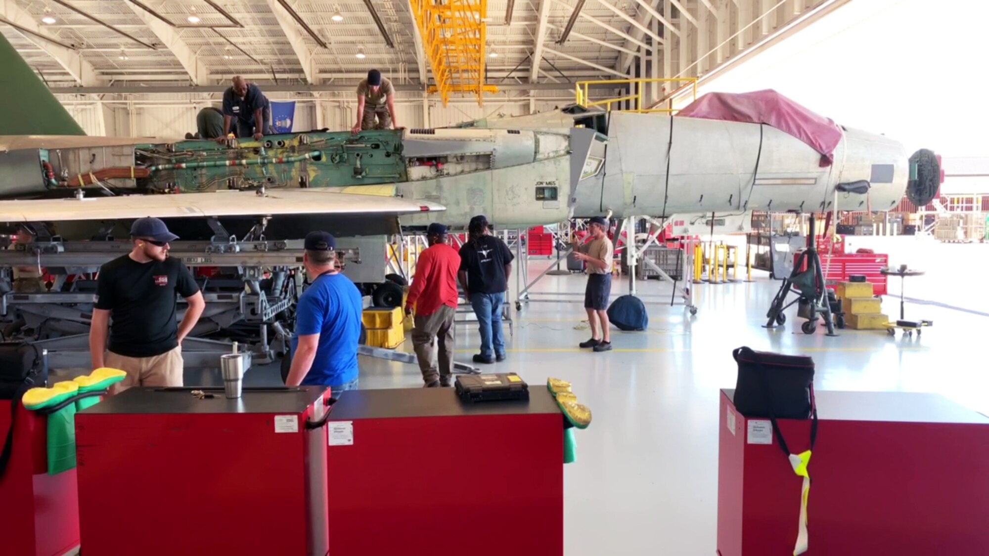 mechanics working on an airplane