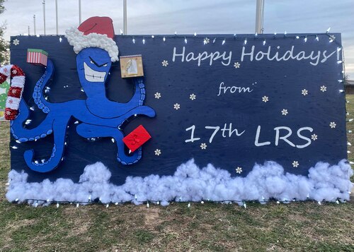 The 17th Logistics Readiness Squadron’s holiday card is displayed on the parade field, Goodfellow Air Force Base, Texas, Dec. 1, 2022. Units designed holiday cards to compete in the yearly tradition. (U.S. Air Force photo by Airman 1st Class Zachary Heimbuch)