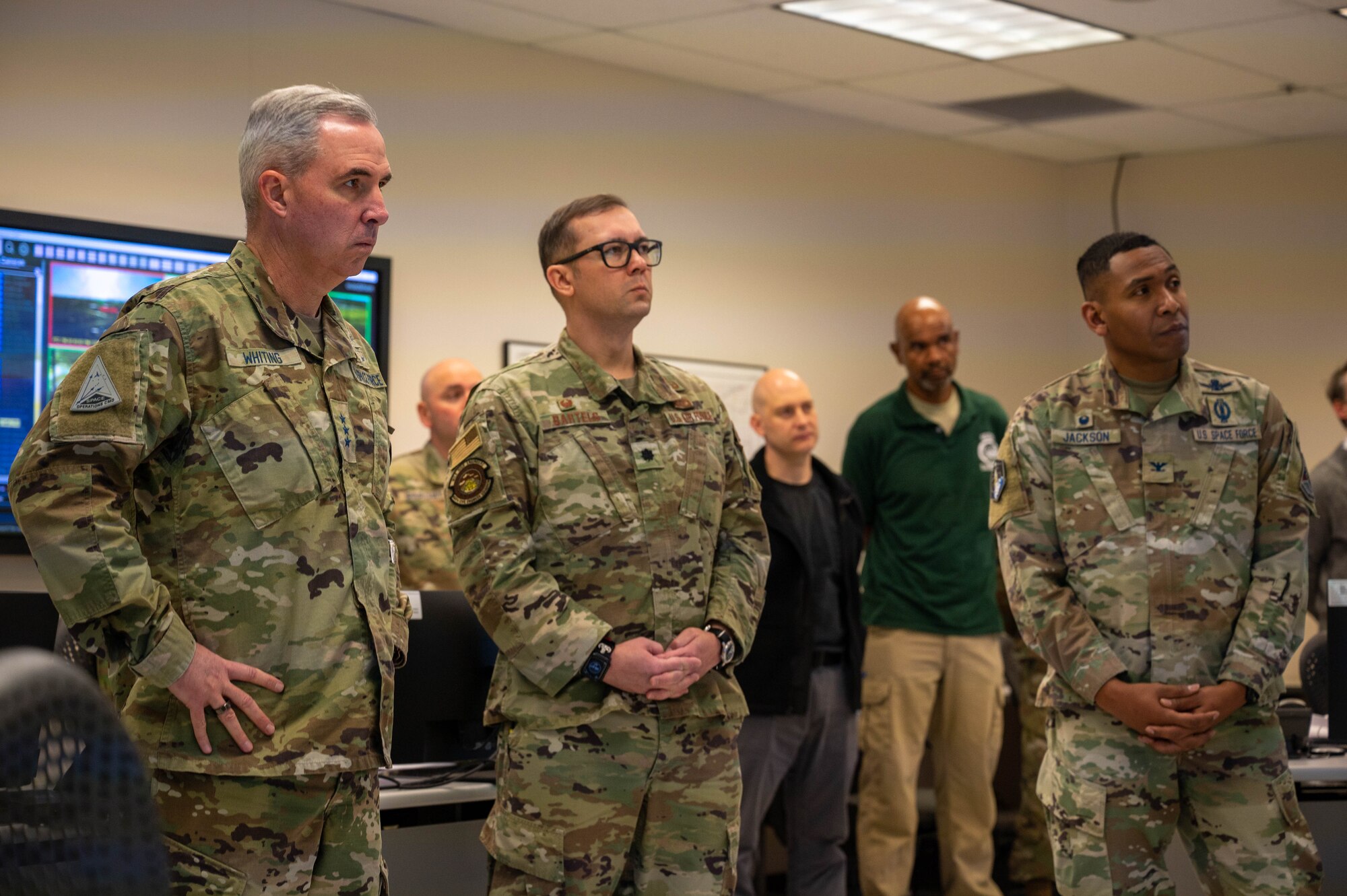 Lt. Gen. Stephen Whiting, commander of Space Operations Command, receives a briefing from the 460th Civil Engineering Squadron to gain a deeper understanding of the procedures and projects of the team at Buckley Space Force Base, Colo., 12 Dec, 2022.