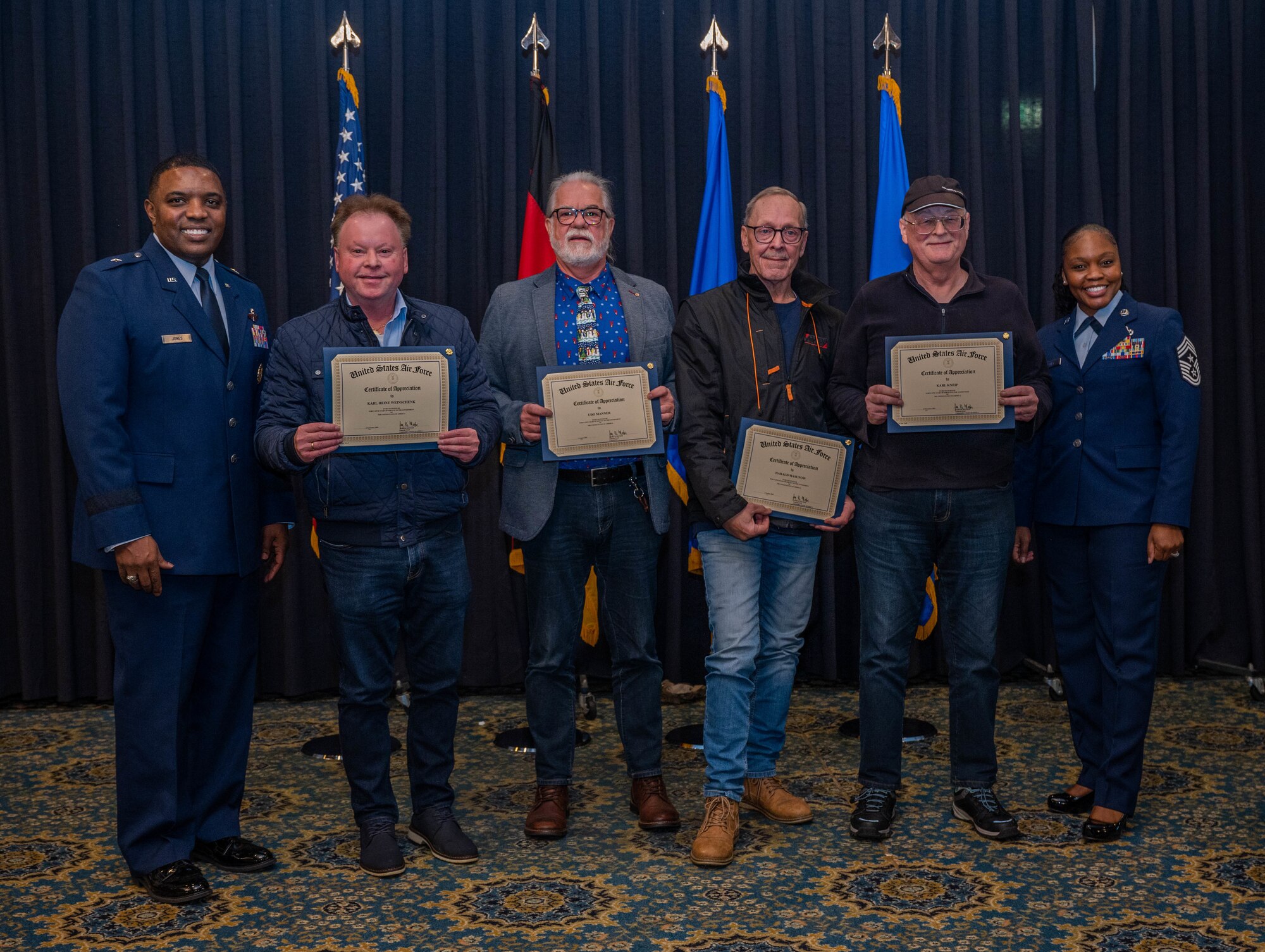Members of Ramstein Air Base, Germany, are recognized by the 86th Airlift Wing command team for dedicating 45 years of service to the U.S. Air Force during a length of service ceremony at RAB, Dec. 8, 2022.