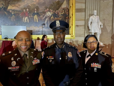 Army COL. Moses Robinson, commander of 74th Troop Command and Director of Operations (G3), and Command Sgt. Maj. Octavia Williamson, Land Component Command and G3 Command Sergeant Major, join other first responders at the White House Congressional Gold Medal Ceremony. The ceremony honored the service and sacrifice of those who protected the United States Capitol on January 6, 2021.