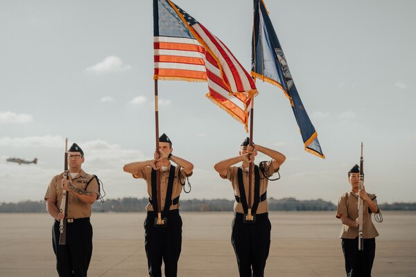 Four Sailors performing as color guard