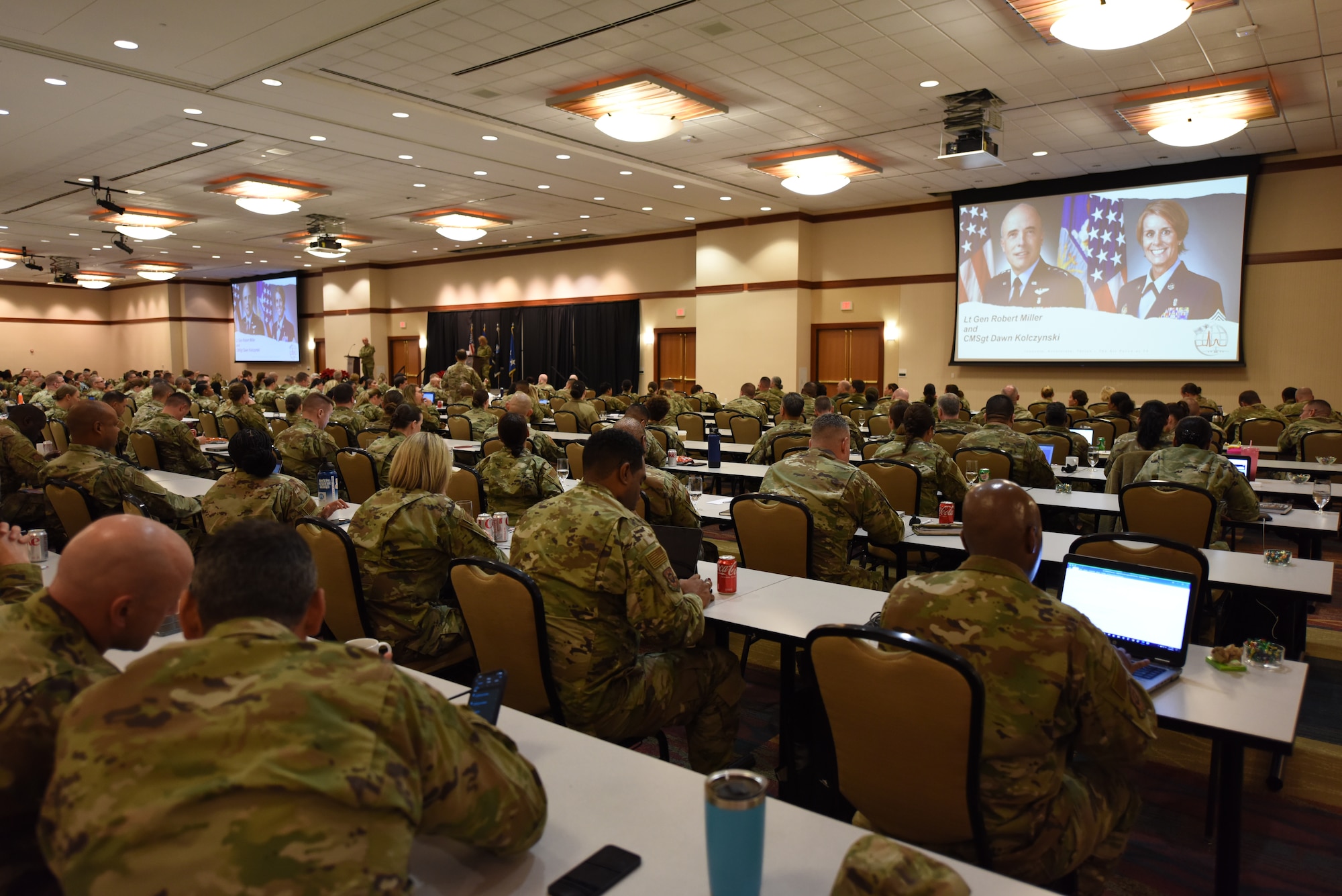 Image of Airmen looking at a presentation.