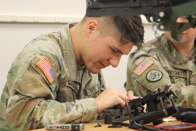 Pfc. Felix Granados breaks down the bolt for the M2 Machine Gun.
During the 7-day unit armorer course at RTSM-Devens, 19 students learned how to disassemble reassemble and perform a functions check on 7 different weapons systems.