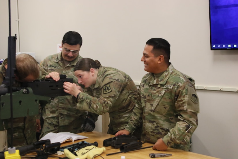 Spc. Emma Burbridge and her table mates work through reassembling the M2 Machine Gun.
During the 7-day unit armorer course at RTSM-Devens, 19 students learned how to disassemble reassemble and perform a functions check on 7 different weapons systems.