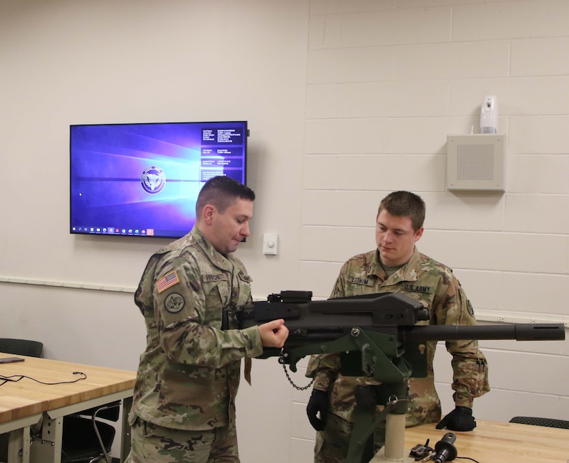 Staff Sgt. Luke Prichett performs a functions check on the Mark 19 after reassembling the weapon.
During the 7-day unit armorer course at RTSM-Devens, 19 students learned how to disassemble reassemble and perform a functions check on 7 different weapons systems.